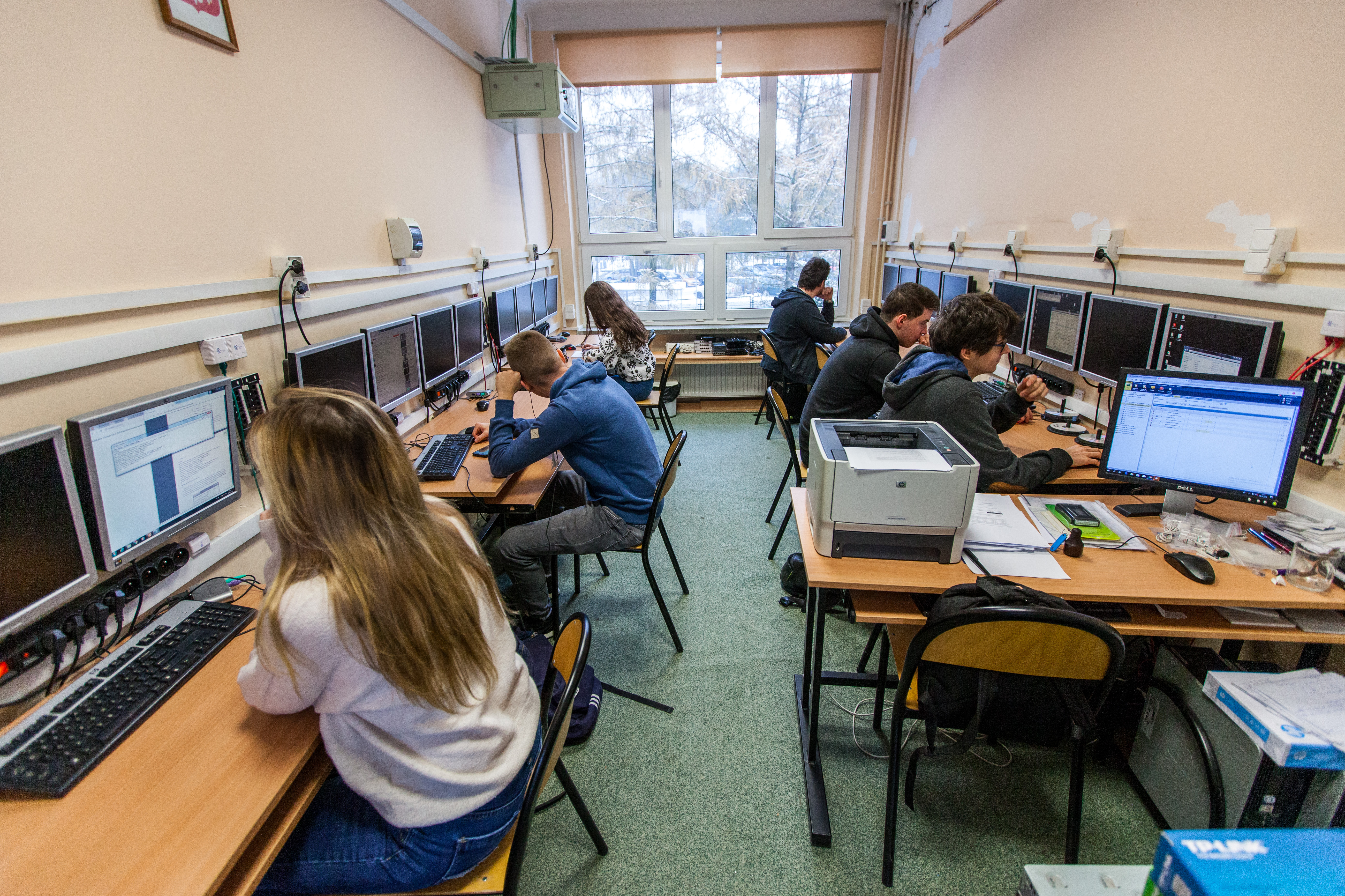 Group of students in a computer laboratory (ICT computer education).